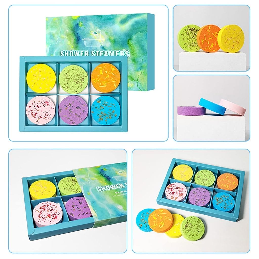 A decorative box containing six Zen Fizzers - Rose Shower Steamers with individual close-up views; these vibrant round tablets come in a variety of scents.