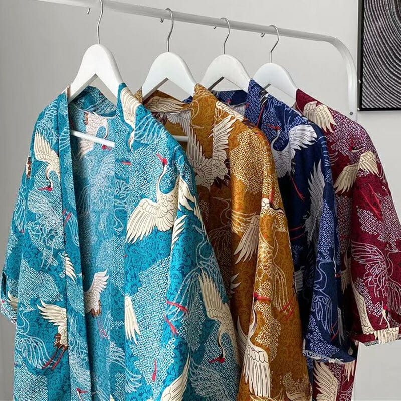 Four Men Kimono Cardigans hanging on a rack.