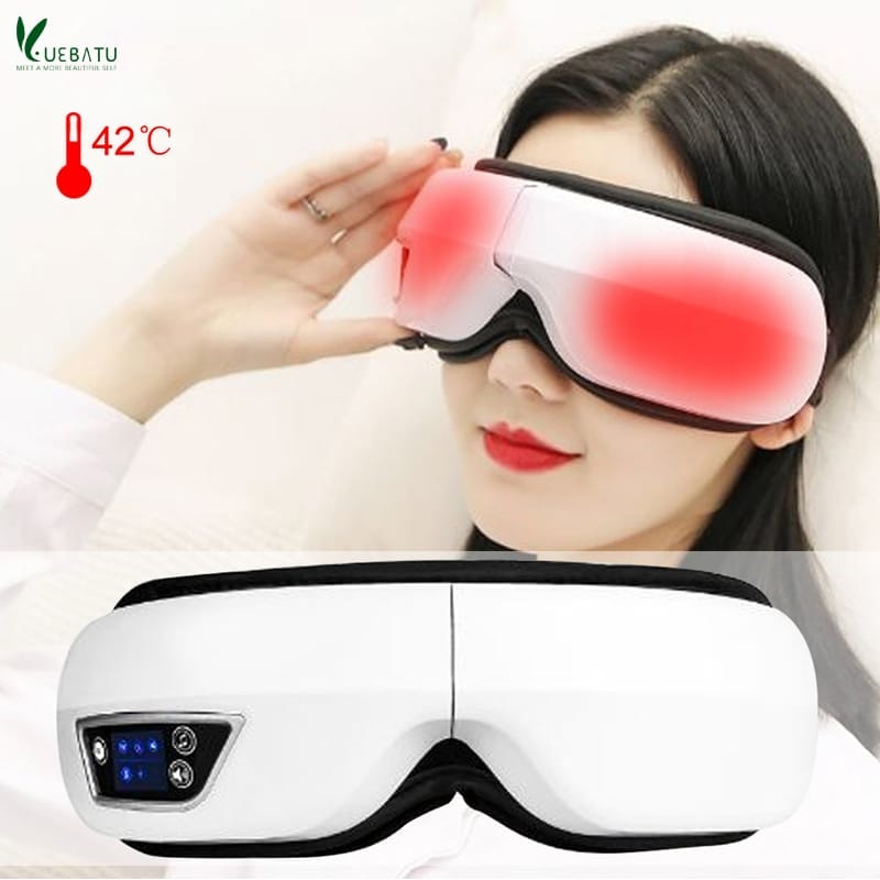 A person indulges in the soothing comfort of the BENBO Eye Massager Foldable Eye Mask, with its digital panel displaying a relaxing 42°C warmth.