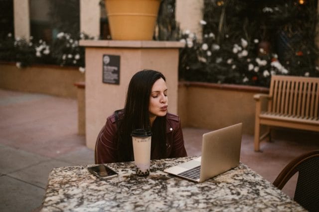 a woman chatting with her boyfriend on the laptop