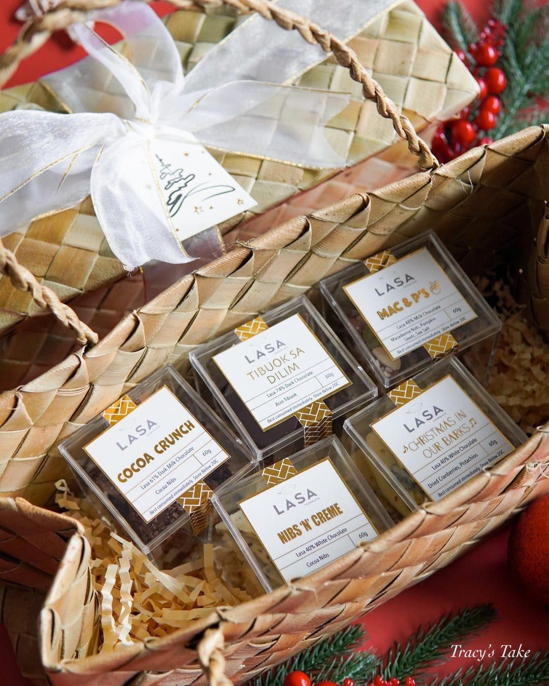 A LASA Tsokolate Gift Sets filled with chocolates and christmas decorations.