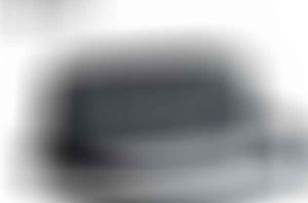 A Shigetsu ESASHI Leather Sling Bag for Men with a strap attached to it.