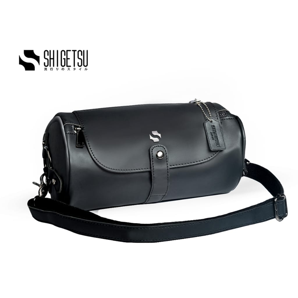 A Shigetsu ESASHI Leather Sling Bag for Men with a strap attached to it.