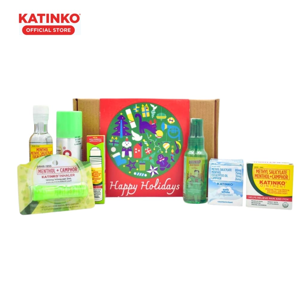 Katinko Gift Set NB featuring a selection of sprays, ointments, and inhalers, presented in front of a holiday-themed box.