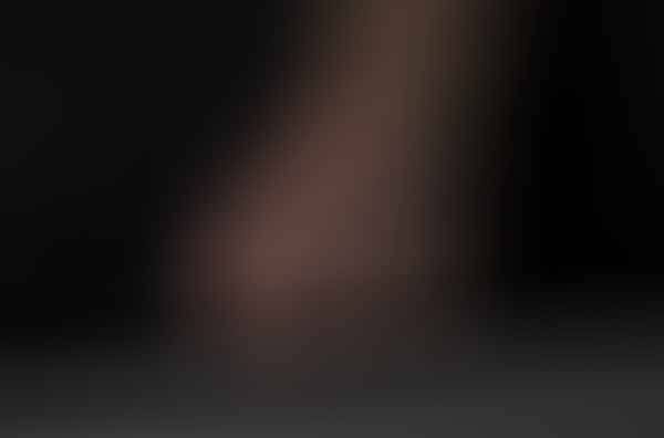 A man wearing a BURVON For Him Bracelet holding a briefcase.