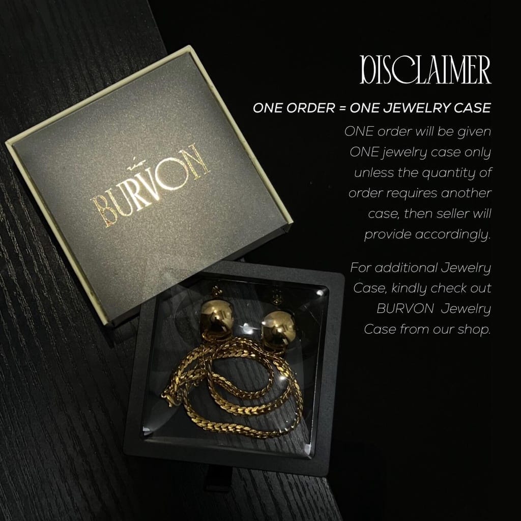 A black box with a gold ring and a BURVON For Him bracelet.
